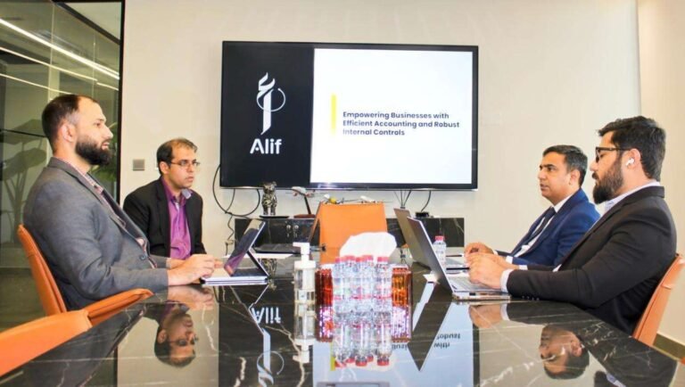 Alif team in a boardroom presentation